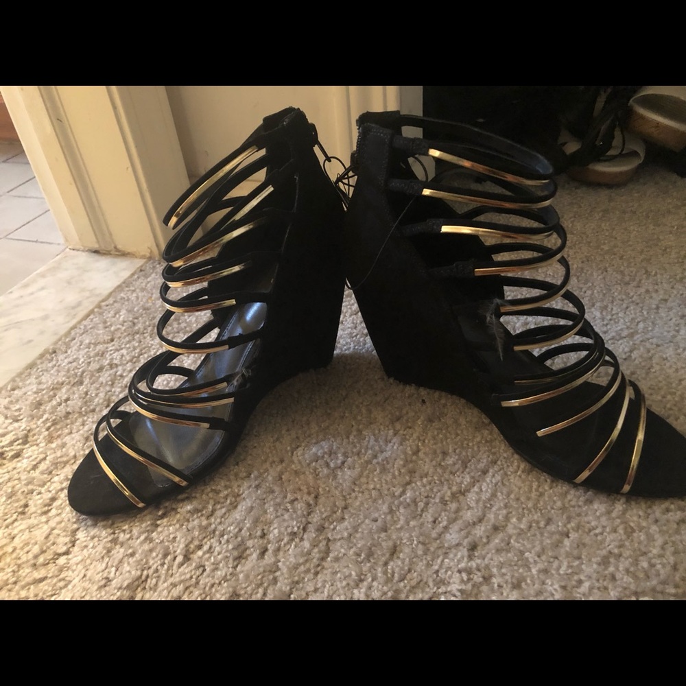 Express black and gold wedges